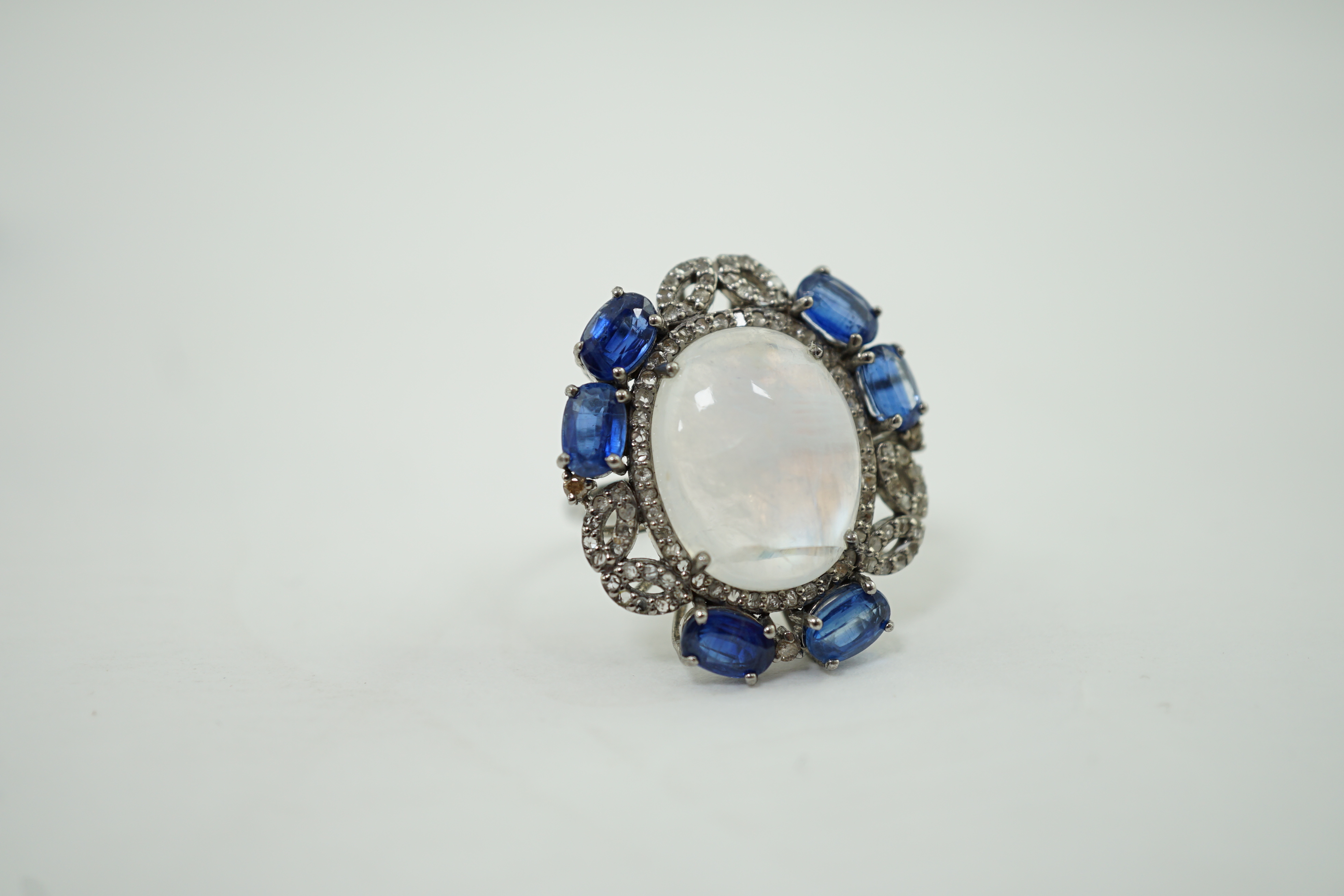 A white gold?, labradorite, sapphire and diamond cluster dress ring